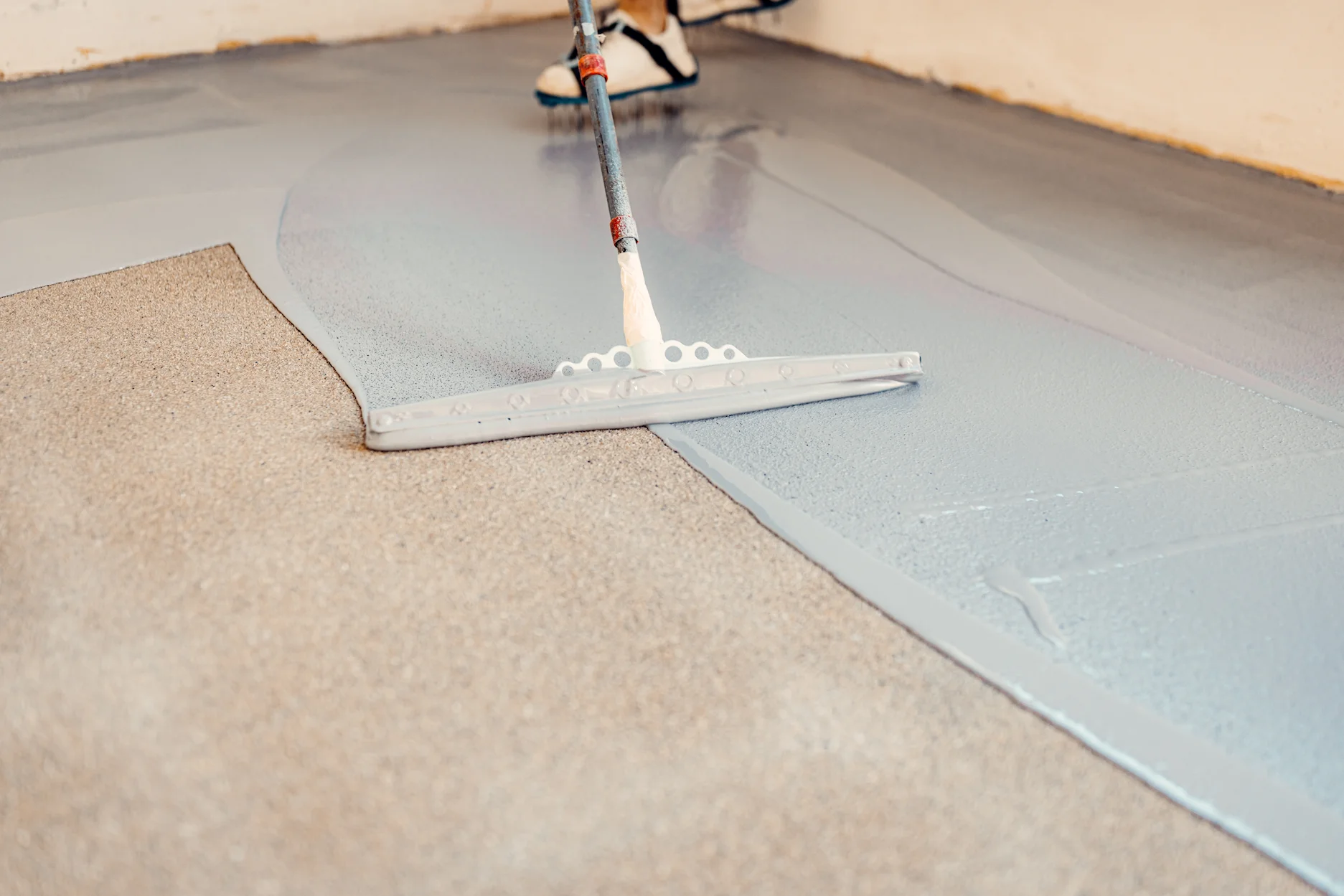 How Long Does Epoxy Flooring Last? Field Data by Environment & System (2026) — Peckham Coatings